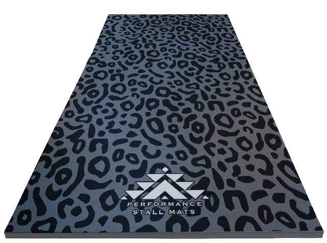 A black leopard printed stall mat on a grey background with the brand 'Performance Stall Mats' visible.